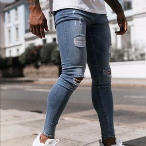 Light Blue Jeans - Ripped. Size 32 Regular.